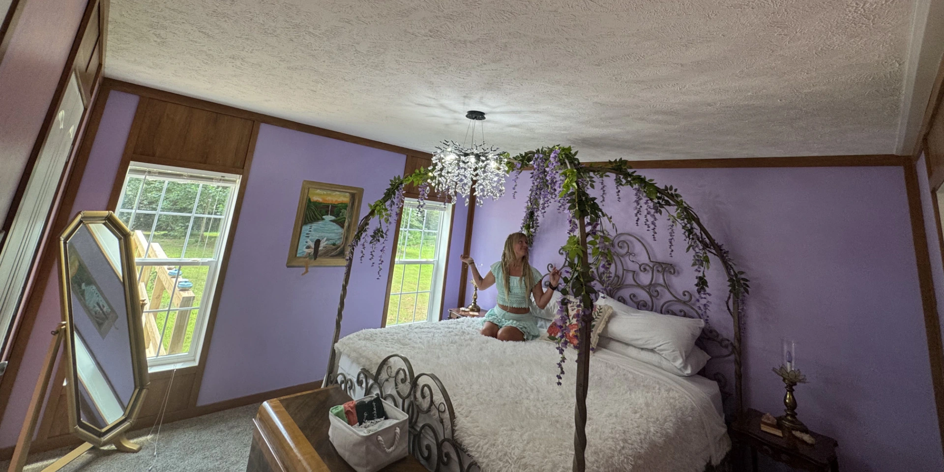 Bed in beautiful purple bedroom